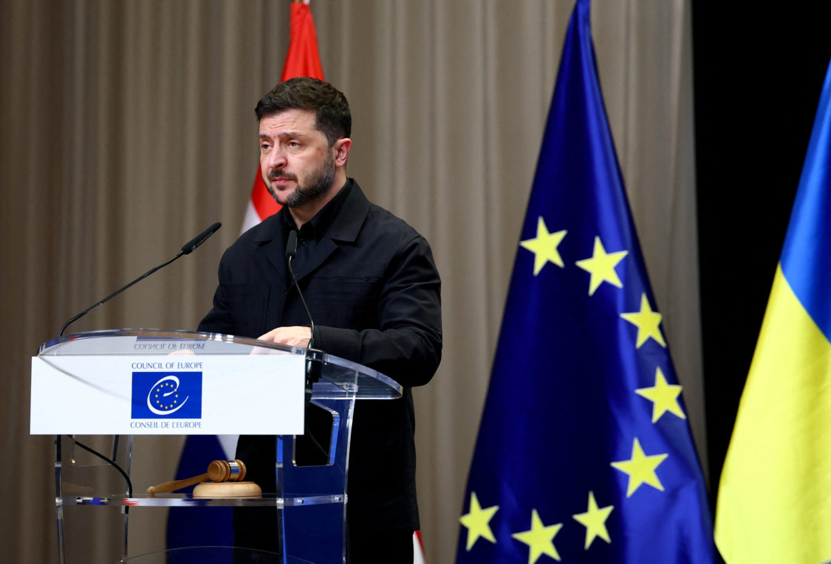 Ukrainian President Volodymyr Zelenskiy speaks during a Council of Europe diplomatic conference to launch the International Claims Commission for Ukraine, aimed at handling compensation claims related to Russia's war in Ukraine, in The Hague, Netherlands, December 16, 2025. REUTERS/Piroschka van de Wouw